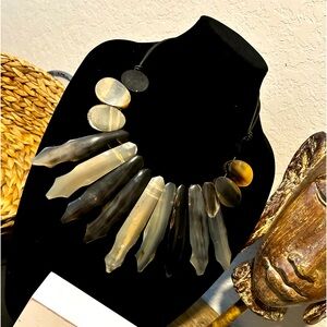 Simulated horn necklace